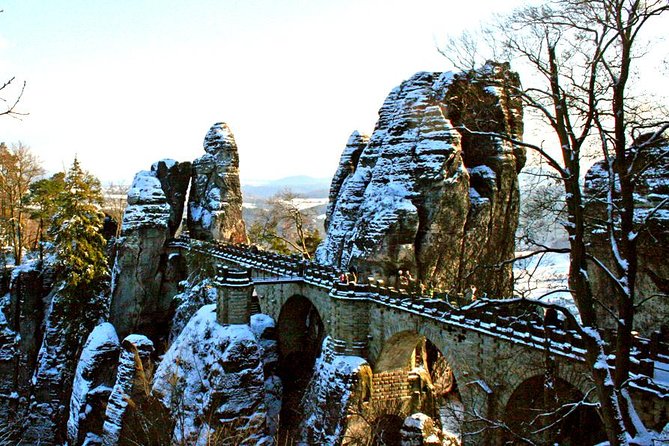 Bohemian and Saxon Switzerland All inclusive trip - Winter Tour - Prague hotel pickup, snacks, and a day that runs on rails