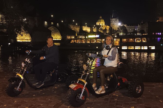 Electric Trike Night Tour in Prague - Live Guided - Charles Bridge by e-trike: the river angle you can’t fake