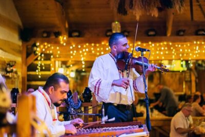 Folk Dinner Experience in Prague with Transportation - Welcome Drink and Menu Choice: How the Dinner Works