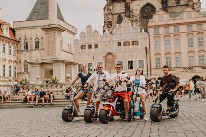 Guided sightseeing e-scooter tour of Prague: 2 hours - Strahovsky Klášter, Communism Memorial, and Natural Breaks