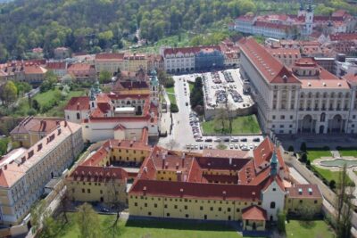 Mozart's Prague: Old Town, Lesser Town & Czech Museum Tour - Entering Old Town: Golden Angel House and Estates Theatre