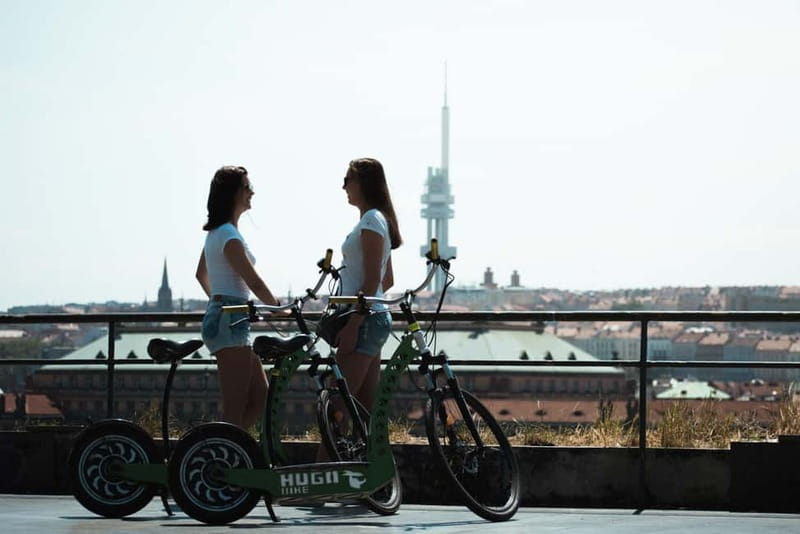 Prague: 3-Hour E-Scooter Tour in German - Expo, restaurants, and the hill-to-castle shift