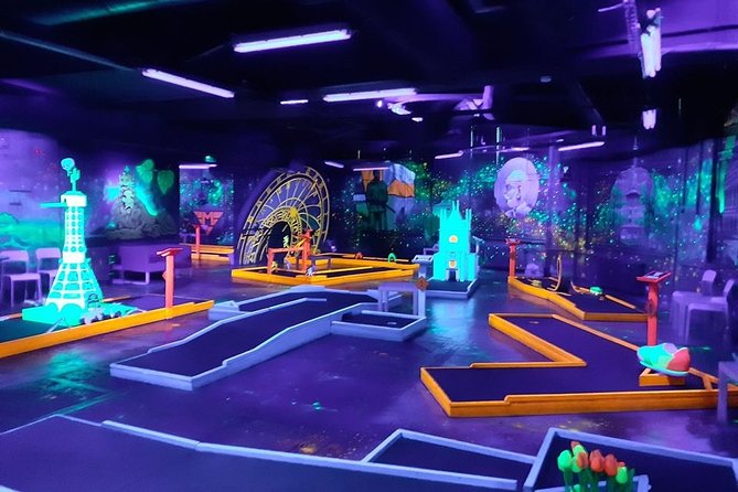Prague Black Light Mini Golf and Games with free Drinks - Entering Prague Golf & Games: Easy to Find, Easy to Start