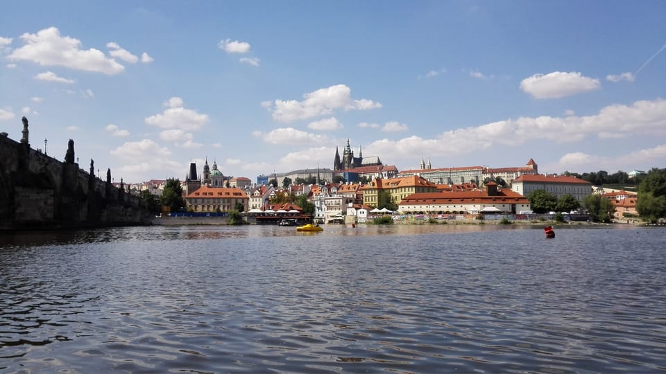 Prague: Old Town Guided Walking Tour and City Boat Ride - The Boat Ride on Vltava Under Charles Bridge: Headsets, Prague Castle Photos, and a Break