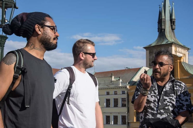 Prague: Old Town, Prague Castle & River Cruise Day Tour - Prague Castle exteriors: history from medieval to modern politics