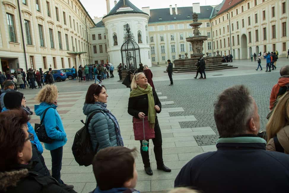 Prague: Prague Castle & Charles Bridge – guided tour in German - From the Bridge to Malostranské Náměstí: Tram Makes It Practical