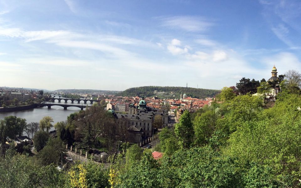 Prague: Stunning Viewpoints, Castle, City & Park E-Bike Tour - Kampa Island break time: a calmer moment over the Old City