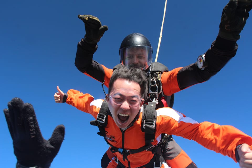 Prague: Tandem Skydiving 14,000ft over Prague with Transfers - Landing and the After-Jump Celebration in Prague’s Time Zone