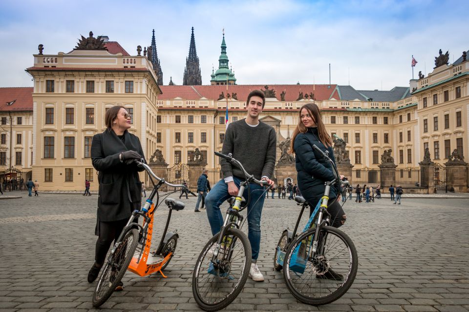 Prague: Tour by Electric Scooter or Cruiser eBike - Franz Kafka Museum and the early culture hit