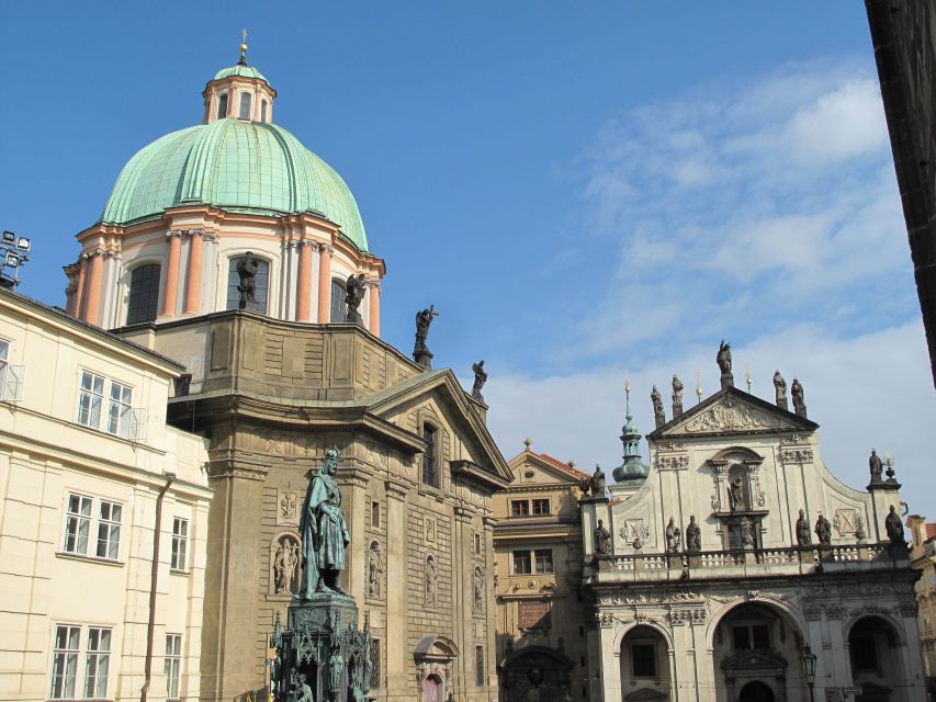 Prague: Vintage Car Ride and Walking Tour - Walking from the Castle toward the Charles Bridge